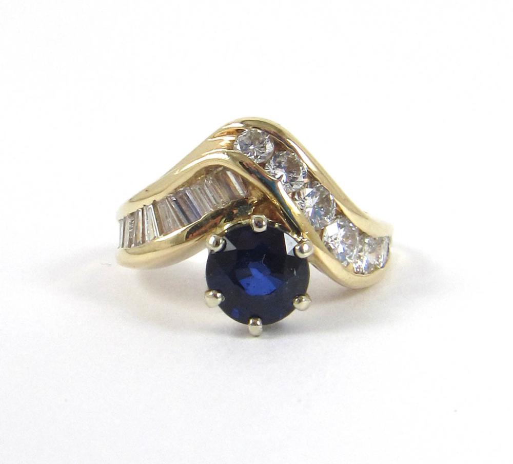 Appraisal: SAPPHIRE DIAMOND AND FOURTEEN KARAT GOLD RING with seven round-cut