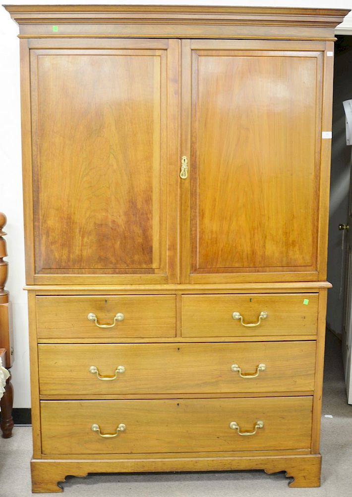 Appraisal: English mahogany armoire cabinet in two parts two doors on