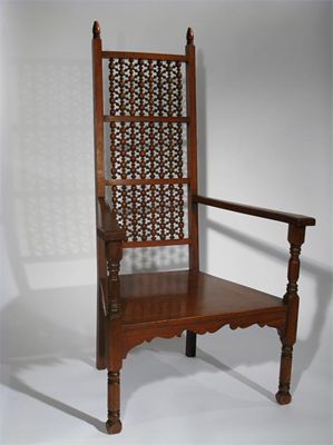 Appraisal: A Liberty Co Moorish armchair the high-back set with Musharbeyeh