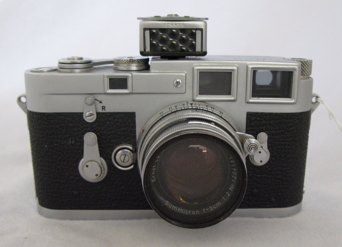 Appraisal: GERMAN LEICA M MM CAMERA AND LENS double stroke winder