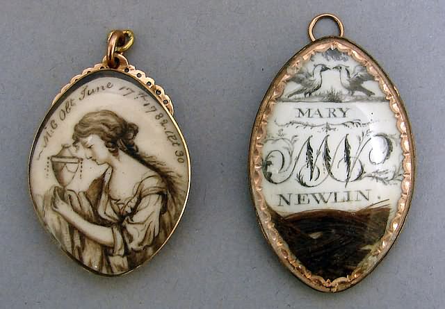 Appraisal: Oval brass-mounted ivory with black paint one marked MARY NEWLIN