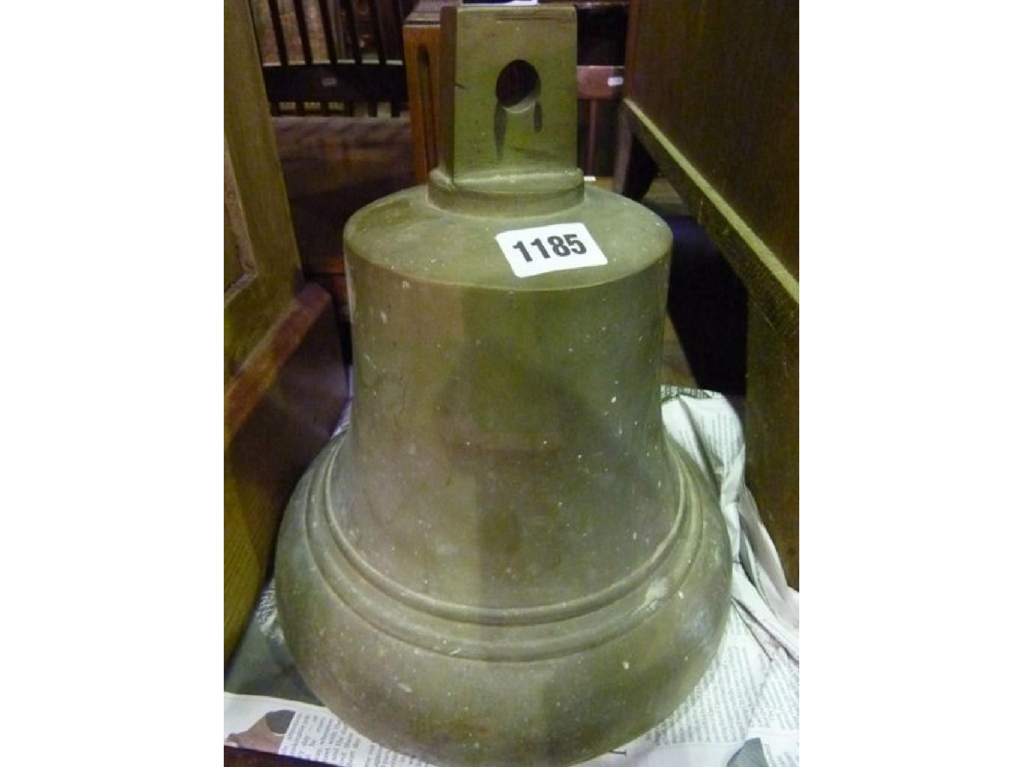 Appraisal: A small but heavy cast brass bell lacks clanger