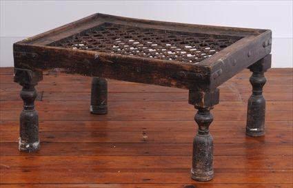 Appraisal: MOROCCAN-STYLE WROUGHT-IRON AND HARDWOOD LOW TABLE The rectangular top framing