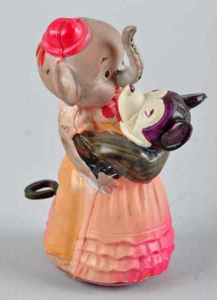 Appraisal: Celluloid Mickey Elmer Elephant Wind-Up Toy Description Japanese Working All