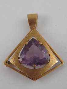 Appraisal: A yellow metal tests carat gold amethyst brooch pendant the