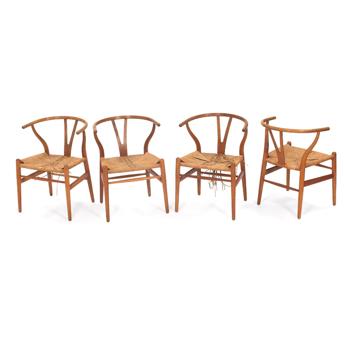 Appraisal: Hans Wegner Wishbone chairs four by Carl Hansen Denmark oak