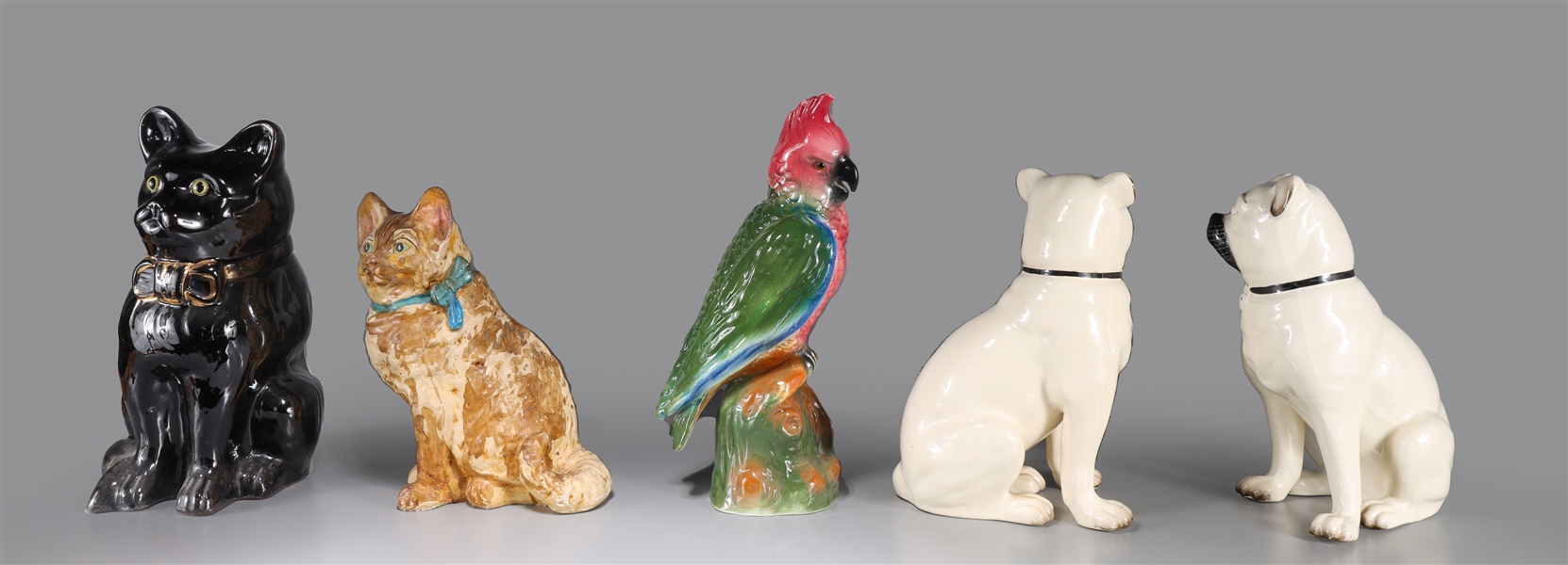 Appraisal: Group of five various ceramic animals including pair of dogs