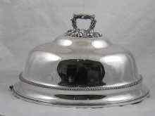 Appraisal: A large tall silver plated meat cover with gadrooned waist