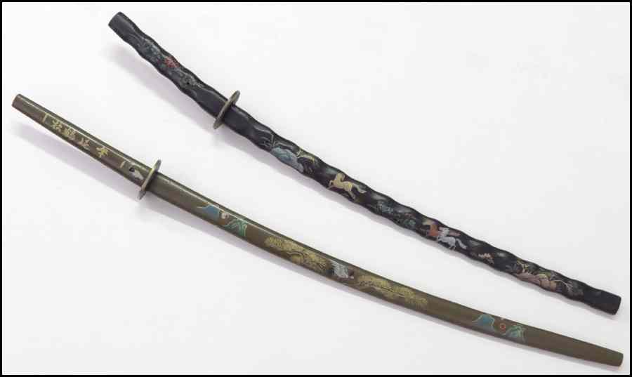 Appraisal: TWO JAPANESE LACQUERED SWORDS WITH SCABBARDS Longer '' Shorter ''