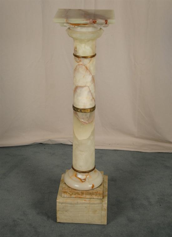 Appraisal: A Marble Cylindrical Pedestal with square shelf and square plinth