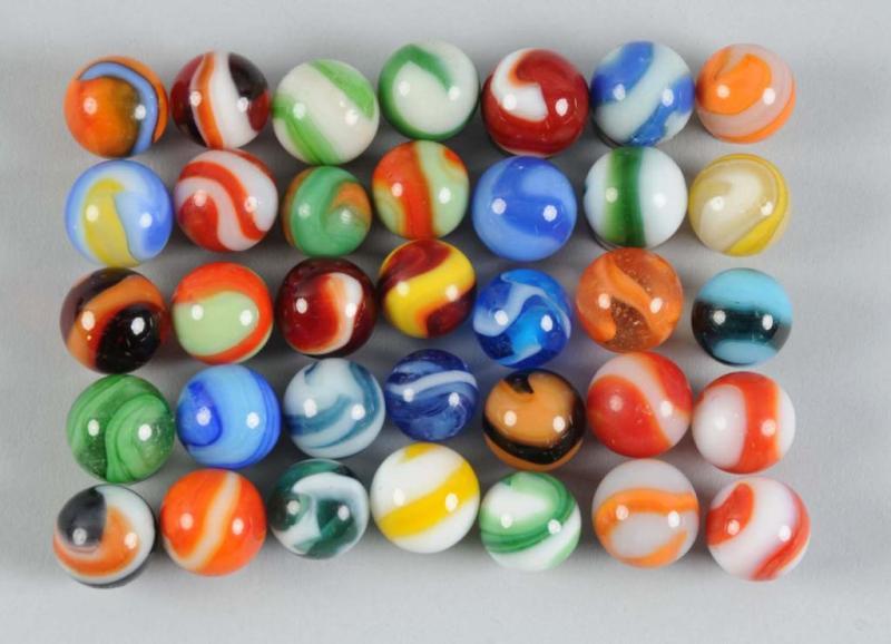 Appraisal: Assortment of Machine-Made Marbles Description Includes approximately marbles Not all