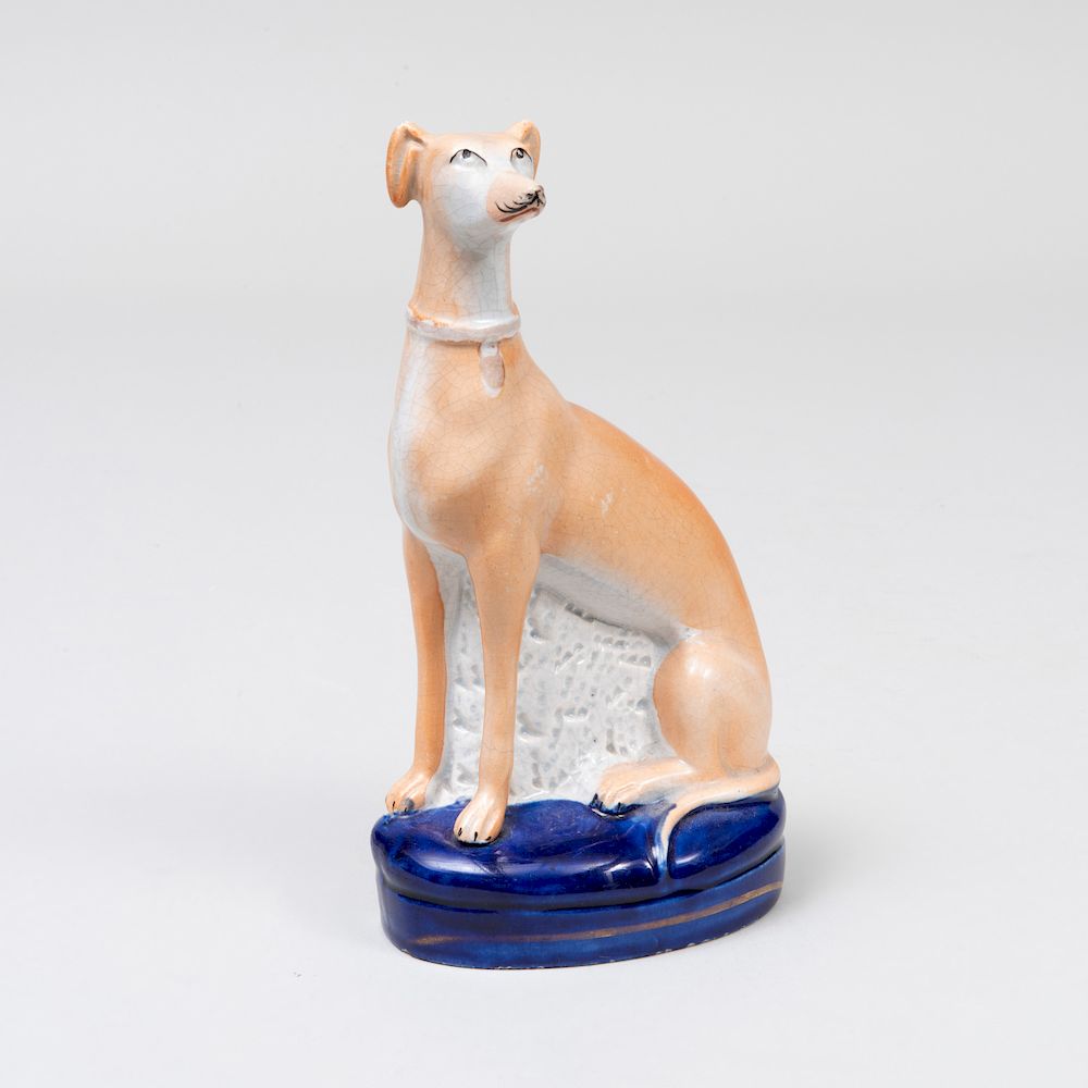 Appraisal: Staffordshire Pottery Model of a Seated Greyhound in high Property