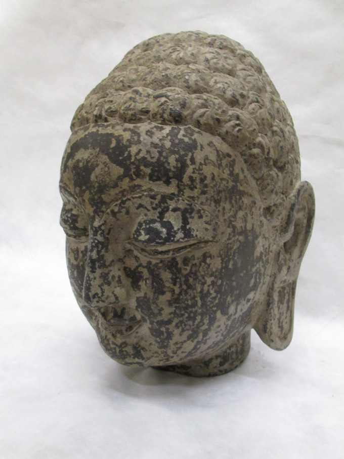 Appraisal: CHINESE CARVED STONE BUDDHA HEAD Tang style carved with serene