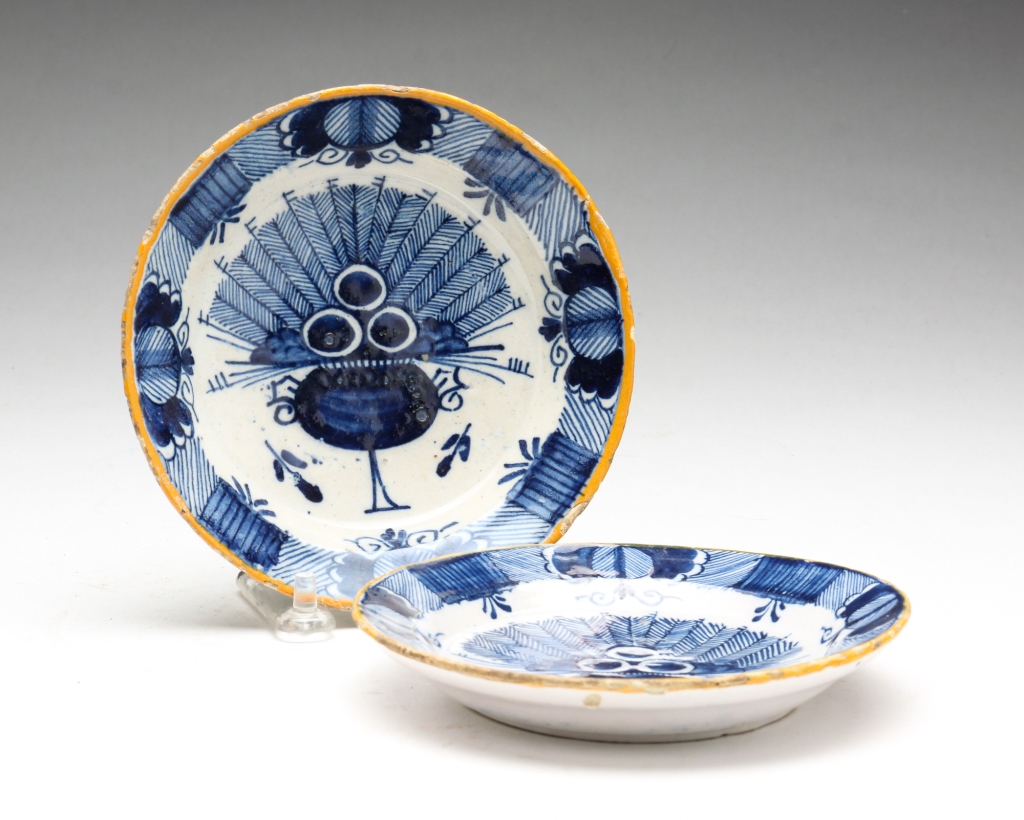 Appraisal: TWO SMALL DELFT DISHES Eighteenth century Very similar peacock feather