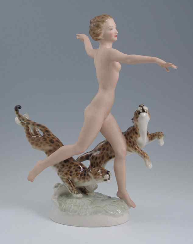 Appraisal: HUTSCHENREUTHER PORCELAIN NUDE FIGURE WITH LEOPARDS Art Deco figurine depicting