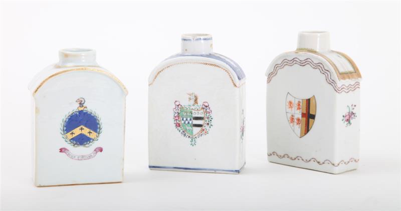 Appraisal: THREE CHINESE EXPORT FAMILLE ROSE ARMORIAL TEA CADDIES Lacking covers