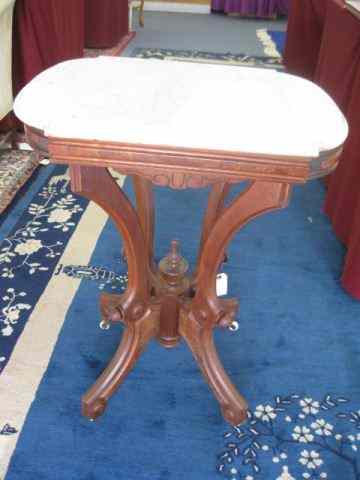 Appraisal: Marble Top Table carved walnut base original castors