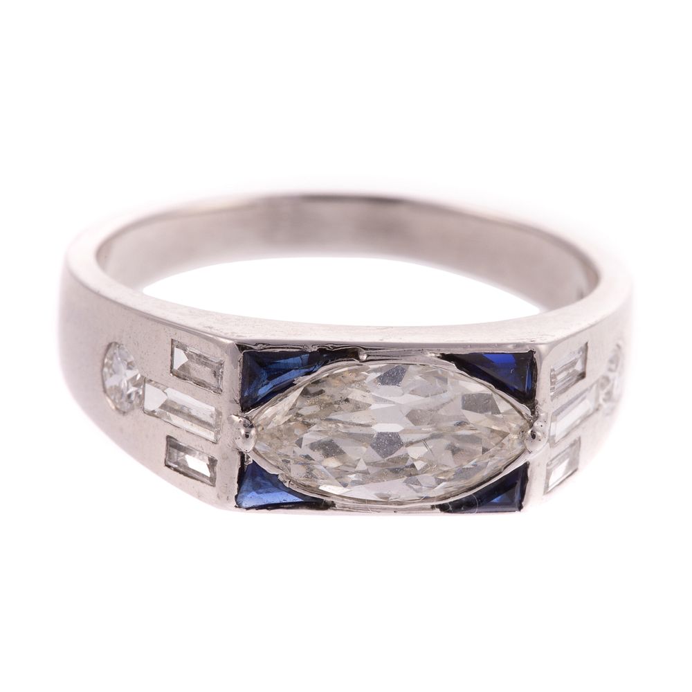 Appraisal: A Marquise Diamond Sapphire Ring in Platinum Platinum ring featuring