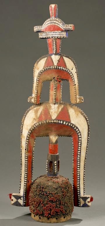 Appraisal: Nigerian anthropomorphic headdress th c A wooden polychrome anthropomorphic headdress