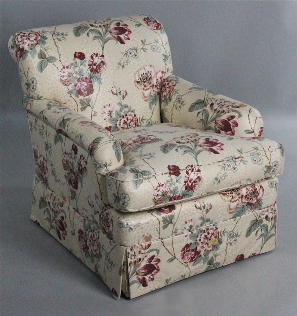 Appraisal: CHINTZ UPHOLSTERED CLUB CHAIR straight with rolled back above a