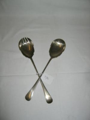 Appraisal: A PAIR OF SERVING SPOONS in Old English pattern with