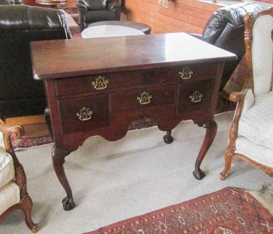 Appraisal: CHIPPENDALE REVIVAL LOWBOY American th century having four drawers over