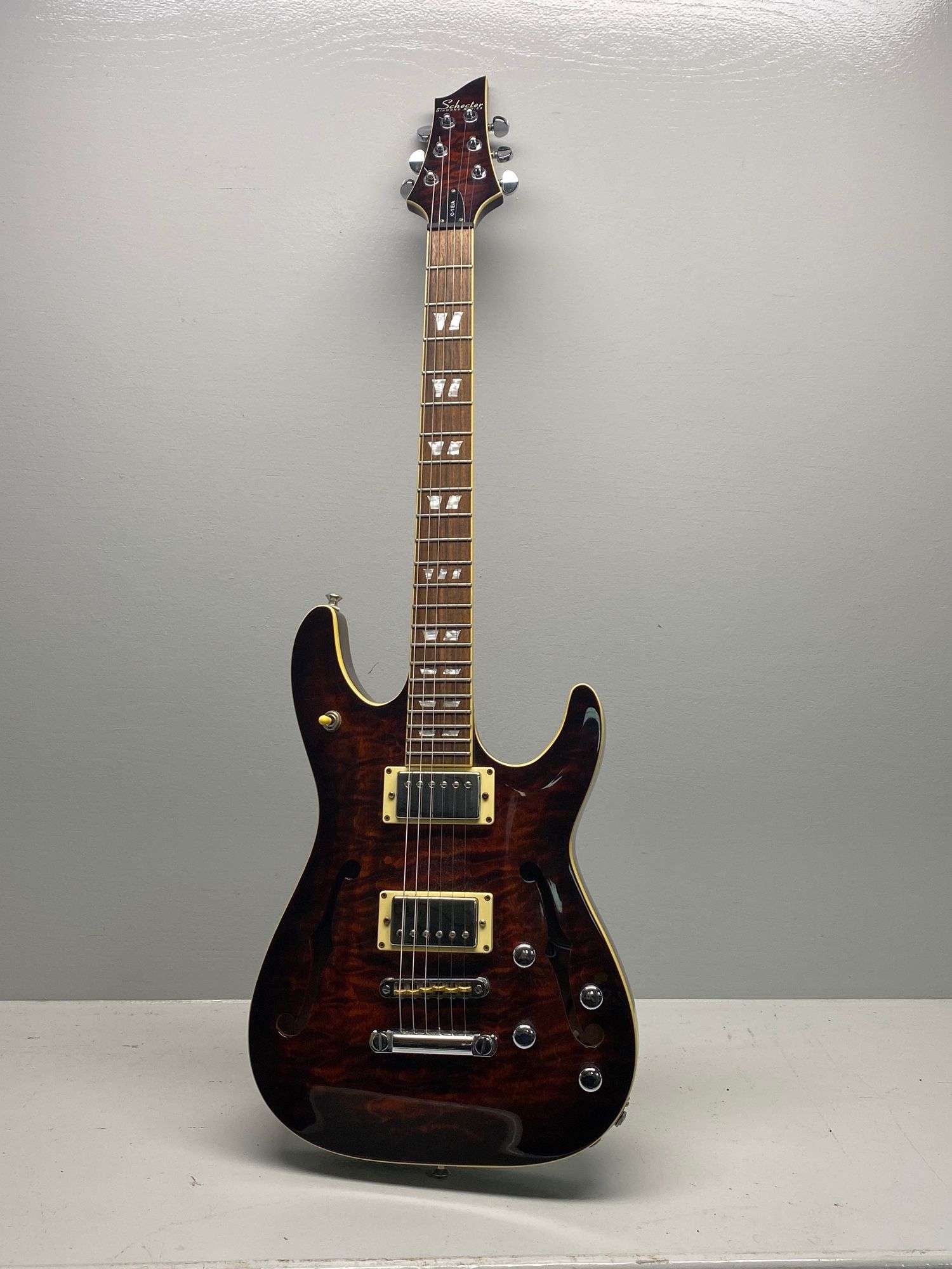 Appraisal: Schecter Diamond Series C- brown flame topSchecter Diamond Series C-