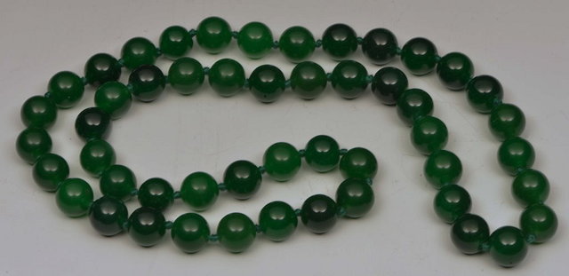 Appraisal: A JADE BEAD NECKLACE th Century