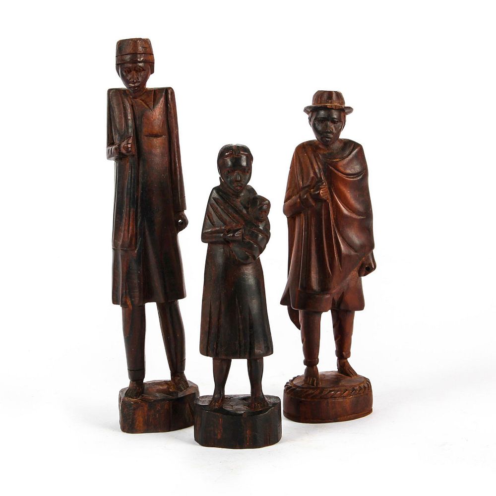 Appraisal: AFRICAN CARVED WOODEN FIGURES TWO MEN WOMAN WITH CHILD Hand