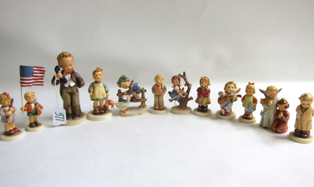 Appraisal: TWELVE HUMMEL FIGURINES with date marks from to present Titles