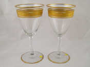 Appraisal: A pair of Baccarat glass goblets with gilt bands the