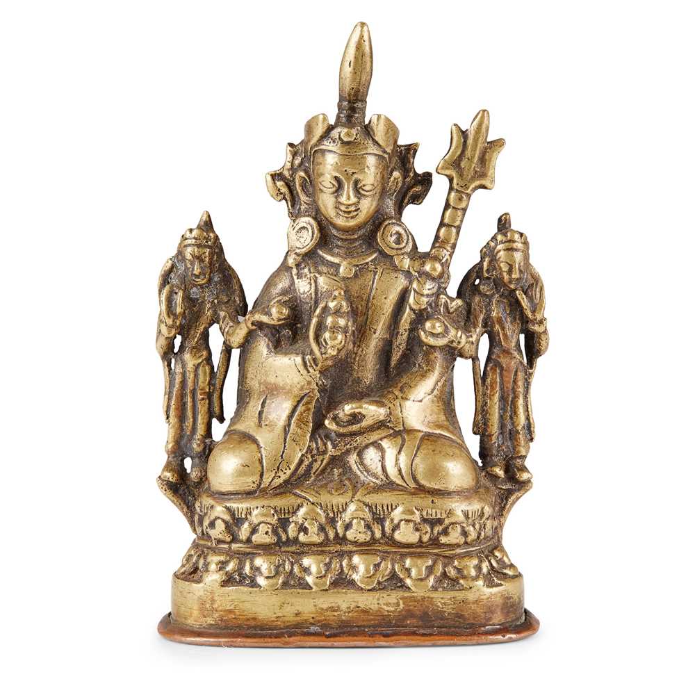 Appraisal: BRONZE TRIAD OF PADMASAMBHAVA AND CONSORTS cast with the Guru