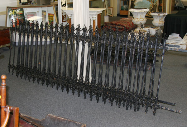 Appraisal: Antique cast iron fencing sections posts ornate vertical casting w