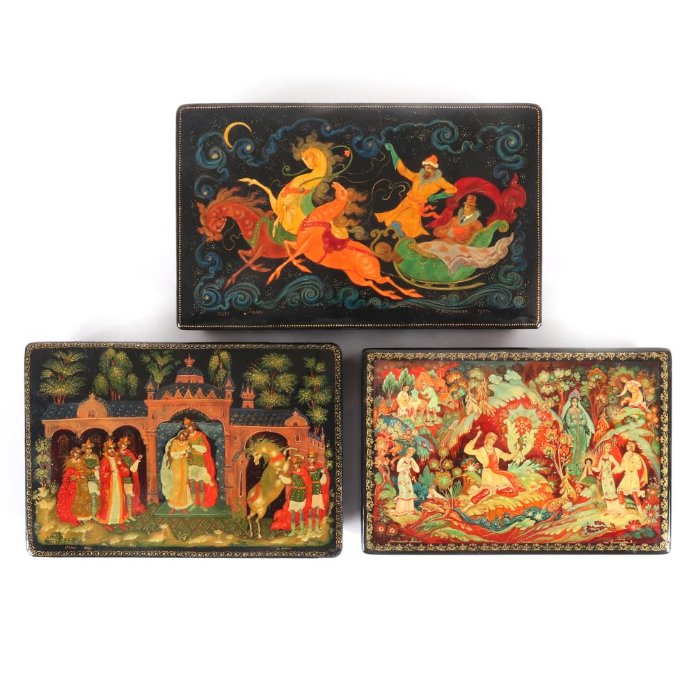 Appraisal: THREE RUSSIAN HAND-PAINTED LACQUER BOXES WITH MYTHICAL SCENES ONE PURCHASED