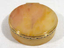 Appraisal: A French circular gold and enamel mounted agate snuff box