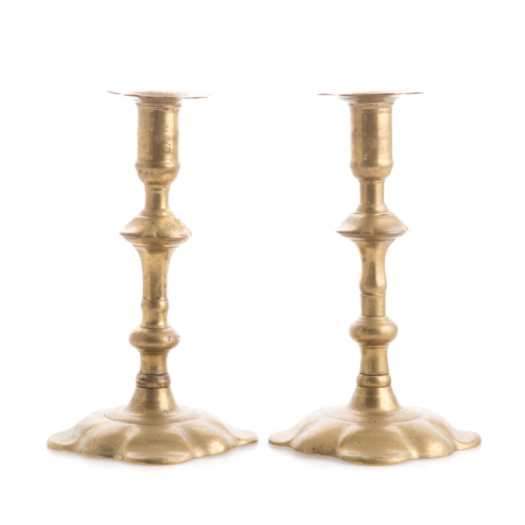 Appraisal: Pair of George II brass petal base candlesticks circa one