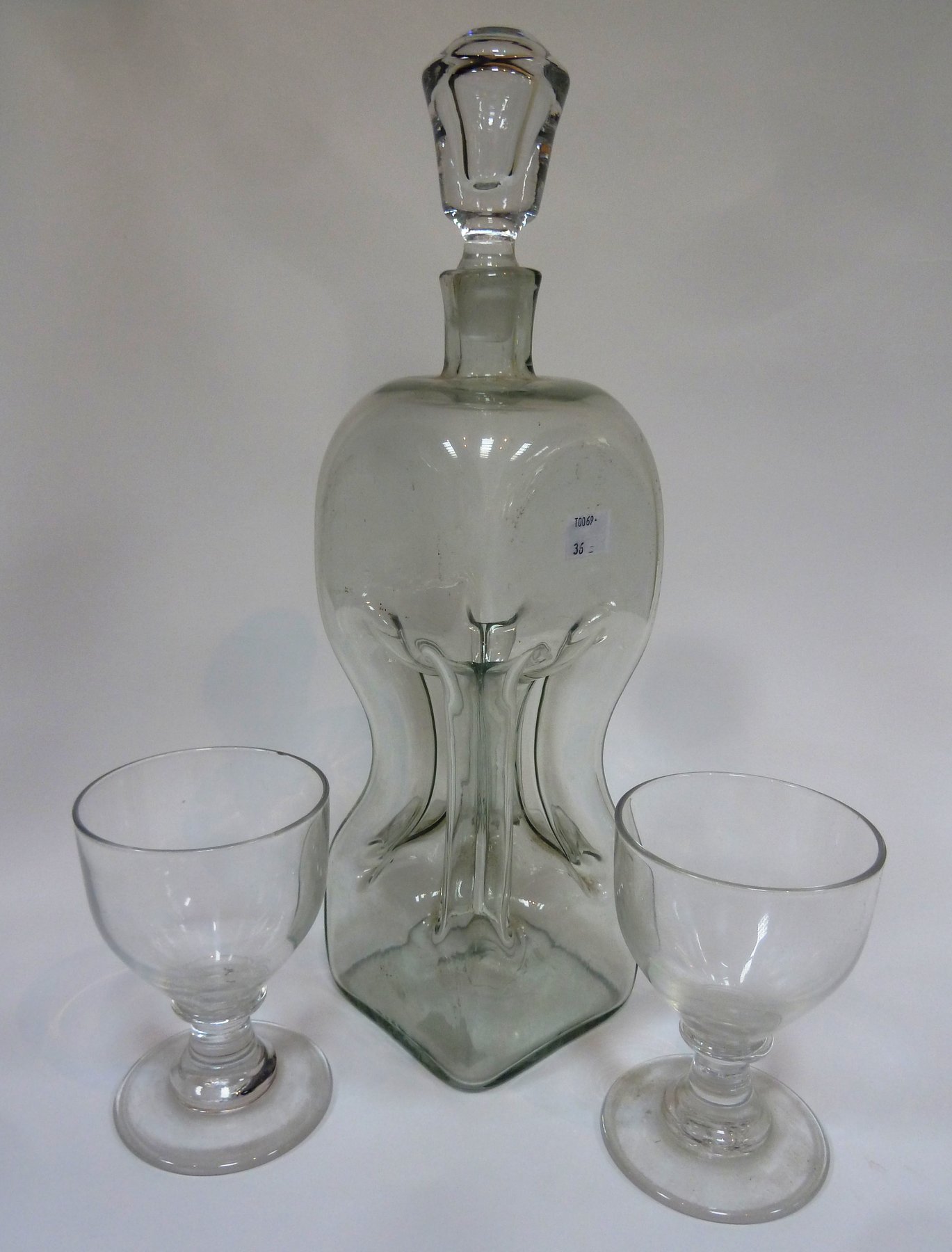 Appraisal: Two glass rummers and an hourglass decanterProvenance Estate of Raymond