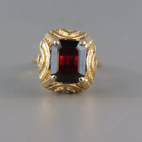 Appraisal: Garnet Ring deep rich rectangular gem in k yellow gold