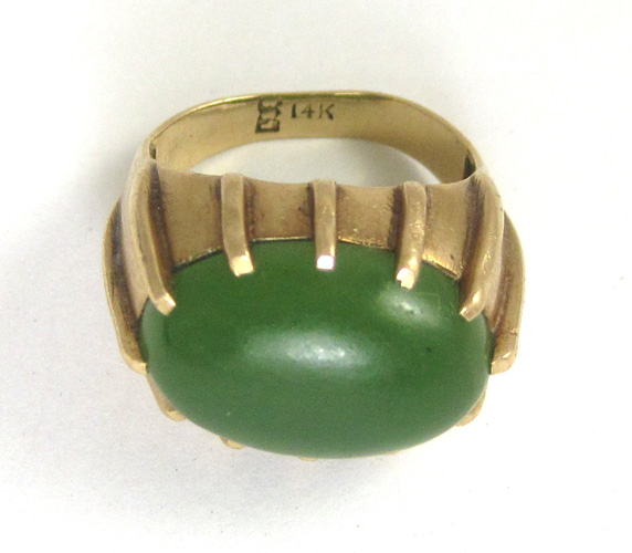 Appraisal: GREEN JADE AND TEN KARAT GOLD RING with twelve yellow