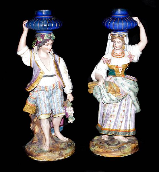 Appraisal: A pair of French bisque porcelain candlesticks height in