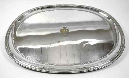 Appraisal: A Continental plated oval tray with moulded rim the centre