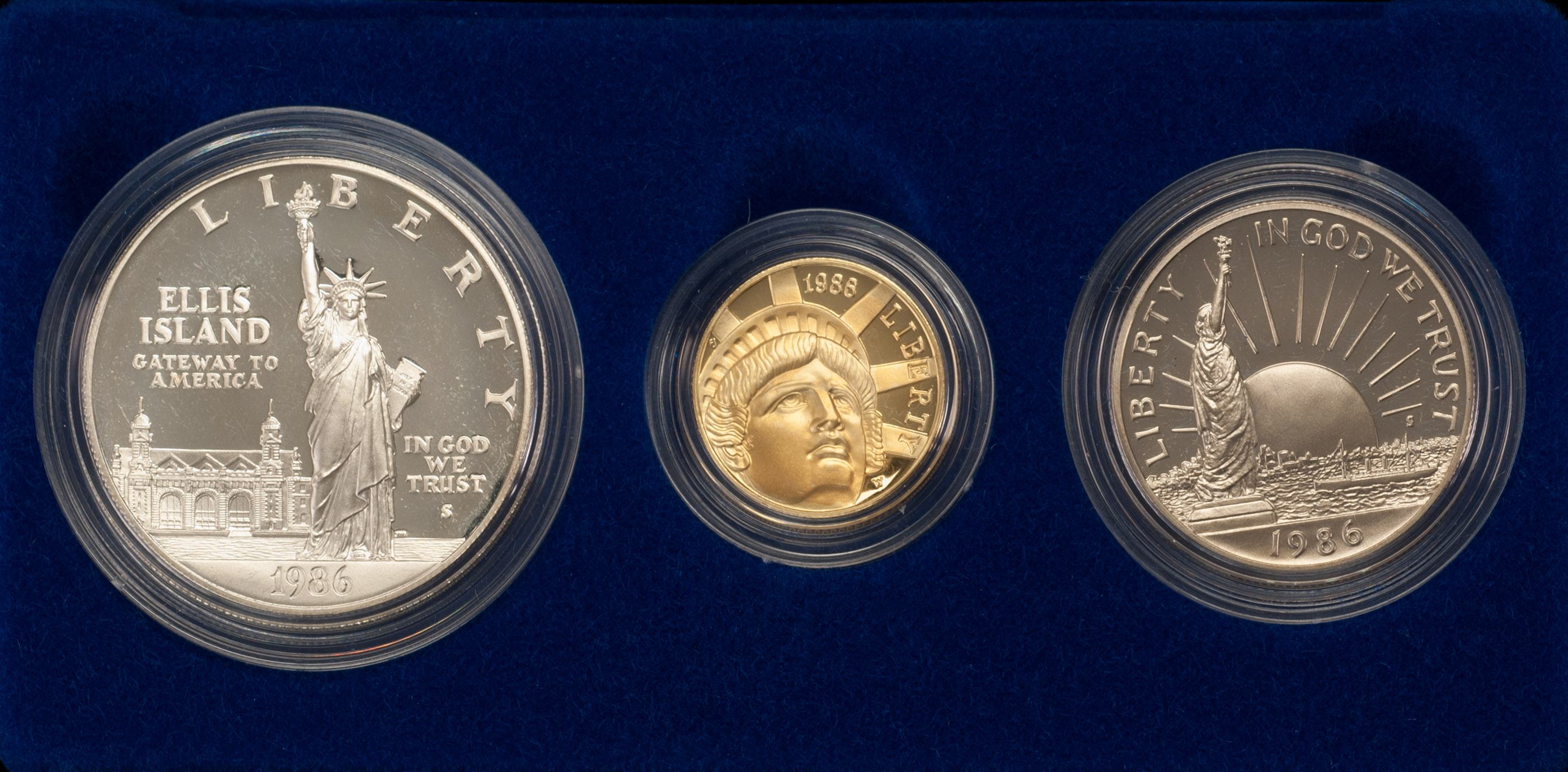 Appraisal: COMMEMORATIVE LIBERTY SET Two silver coins and one gold coin