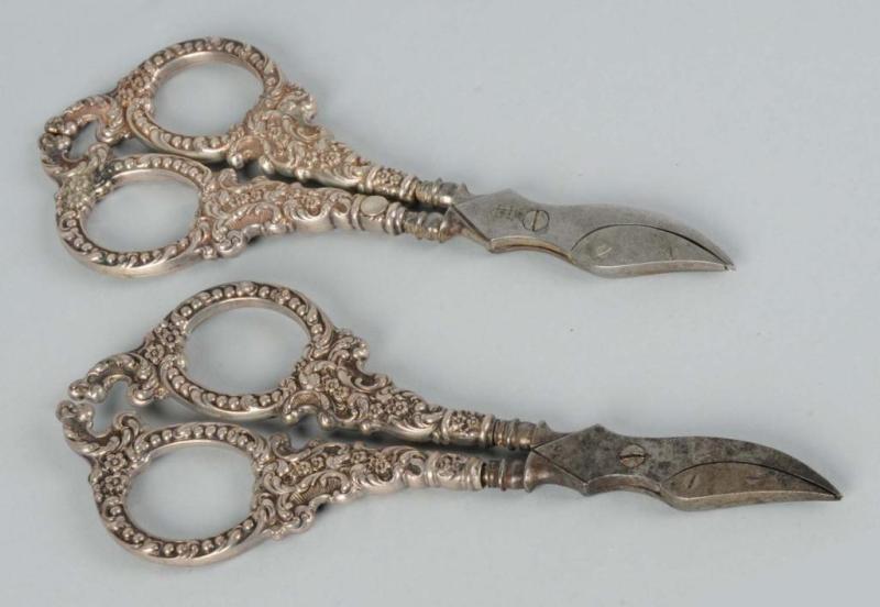 Appraisal: Lot of Pairs of Silver Unger Brothers Scissors Description Each