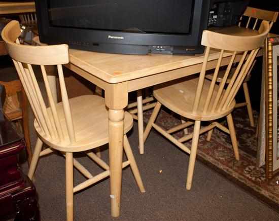 Appraisal: Contemporary maple dinette set comprising table and four spindle-back Windsor