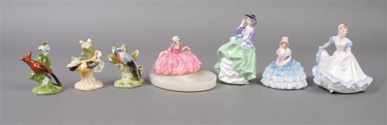 Appraisal: A Group of Royal Doulton Miniature Porcelain Figures Width of