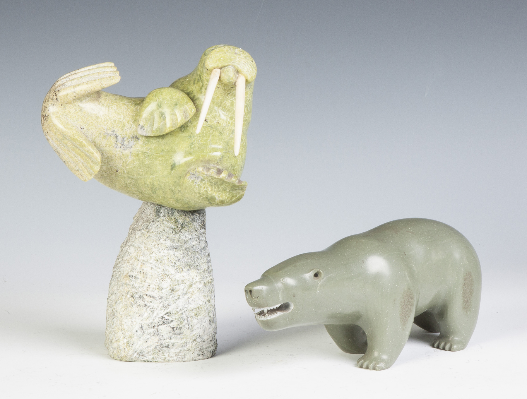 Appraisal: Two Inuit Carvings of a Walrus a Bear