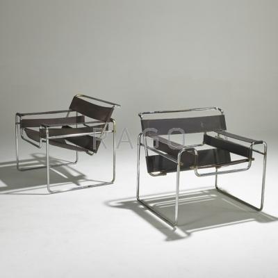 Appraisal: MARCEL BREUER Pair of Wassily chairs s Stitched leather and