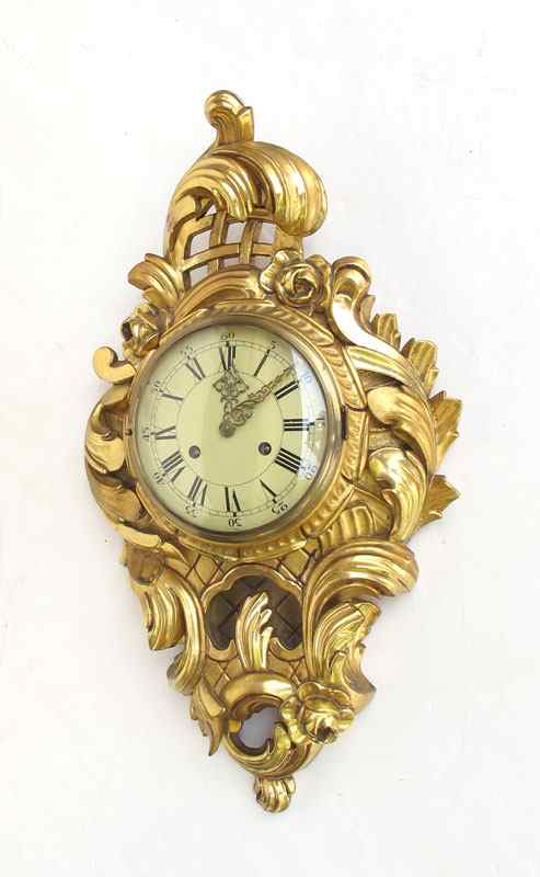 Appraisal: SWEDISH GILT CARVED WOOD CARTEL CLOCK Mid- th century production