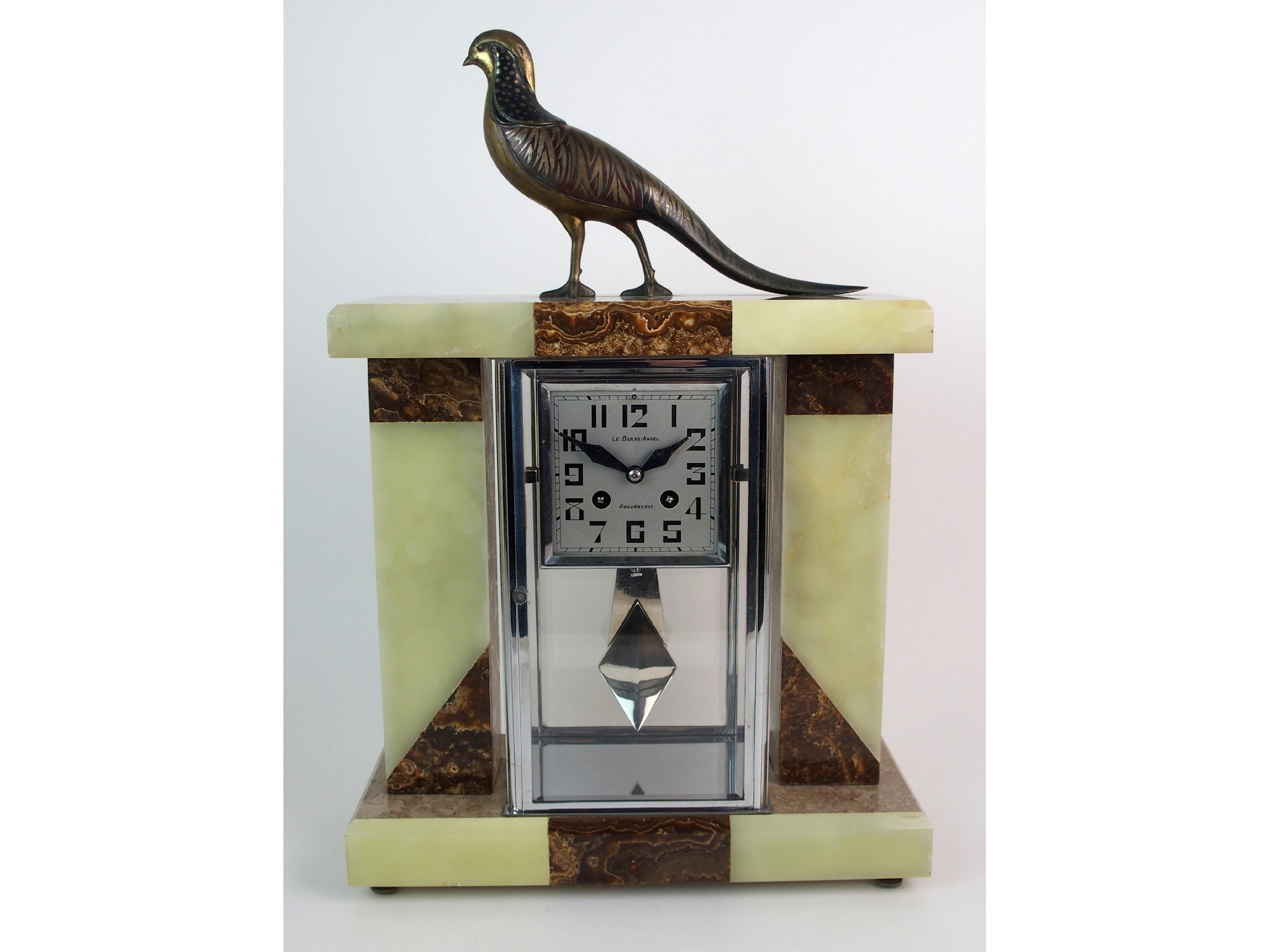 Appraisal: An Art Deco mixed onyx and glass mantle clockthe rectangular