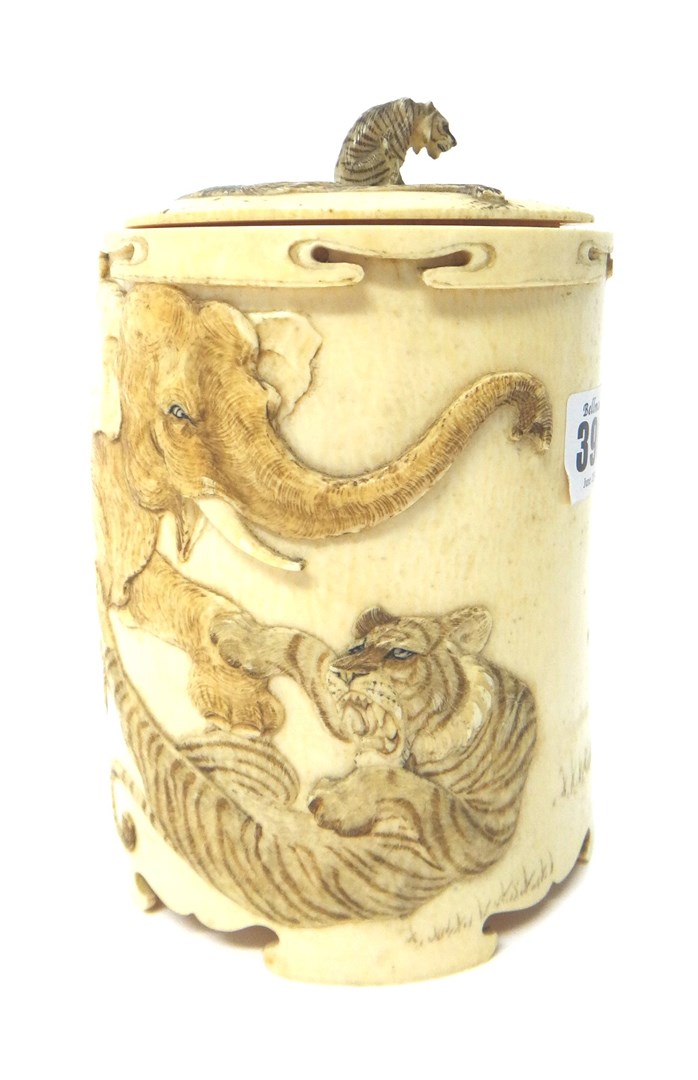 Appraisal: A Japanese ivory tusk box and cover Meiji period carved